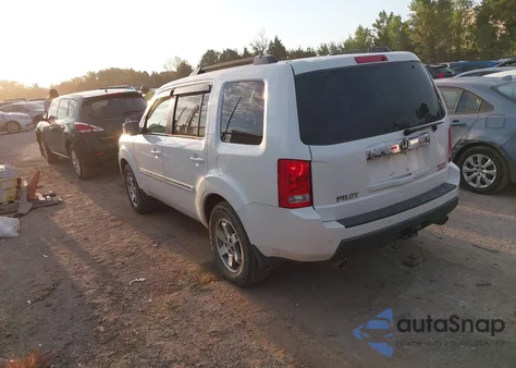 2011 Honda Pilot Touring z USA, uszkodzony, nr VIN 5FNYF4H9XBB095599